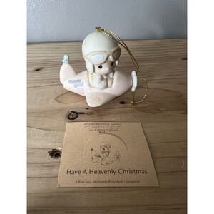1984 Precious Moments porcelain ornament titled "Have A‎ Heavenly Christmas